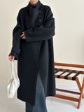 2025 Cashmere wool stand-up collar single-breasted multi-buckle shoulder sleeves extended double-sided woolen cashmere coat women's autumn and winter