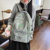 2025 Campus schoolbag female junior high school student simple and versatile printed bear design popular new college student computer backpack male