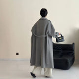 2025 All-wool solid color large lapel lace-up shoulder sleeves extended double-sided cashmere coat woolen jacket to keep warm in autumn and winter