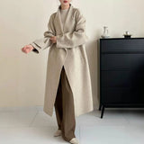 2025 Cashmere wool stand-up collar single-breasted multi-buckle shoulder sleeves extended double-sided woolen cashmere coat women's autumn and winter