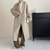 2025 Cashmere wool stand-up collar single-breasted multi-buckle shoulder sleeves extended double-sided woolen cashmere coat women's autumn and winter