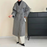 2025 All-wool solid color large lapel lace-up shoulder sleeves extended double-sided cashmere coat woolen jacket to keep warm in autumn and winter