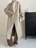 2025 Cashmere wool stand-up collar single-breasted multi-buckle shoulder sleeves extended double-sided woolen cashmere coat women's autumn and winter