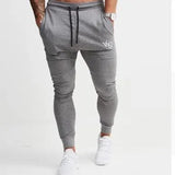 New Fashion Men Spring Pencil Pants Gyms Clothing in Men Skinny Casual Trousers Pants Top Quality Sweatpants